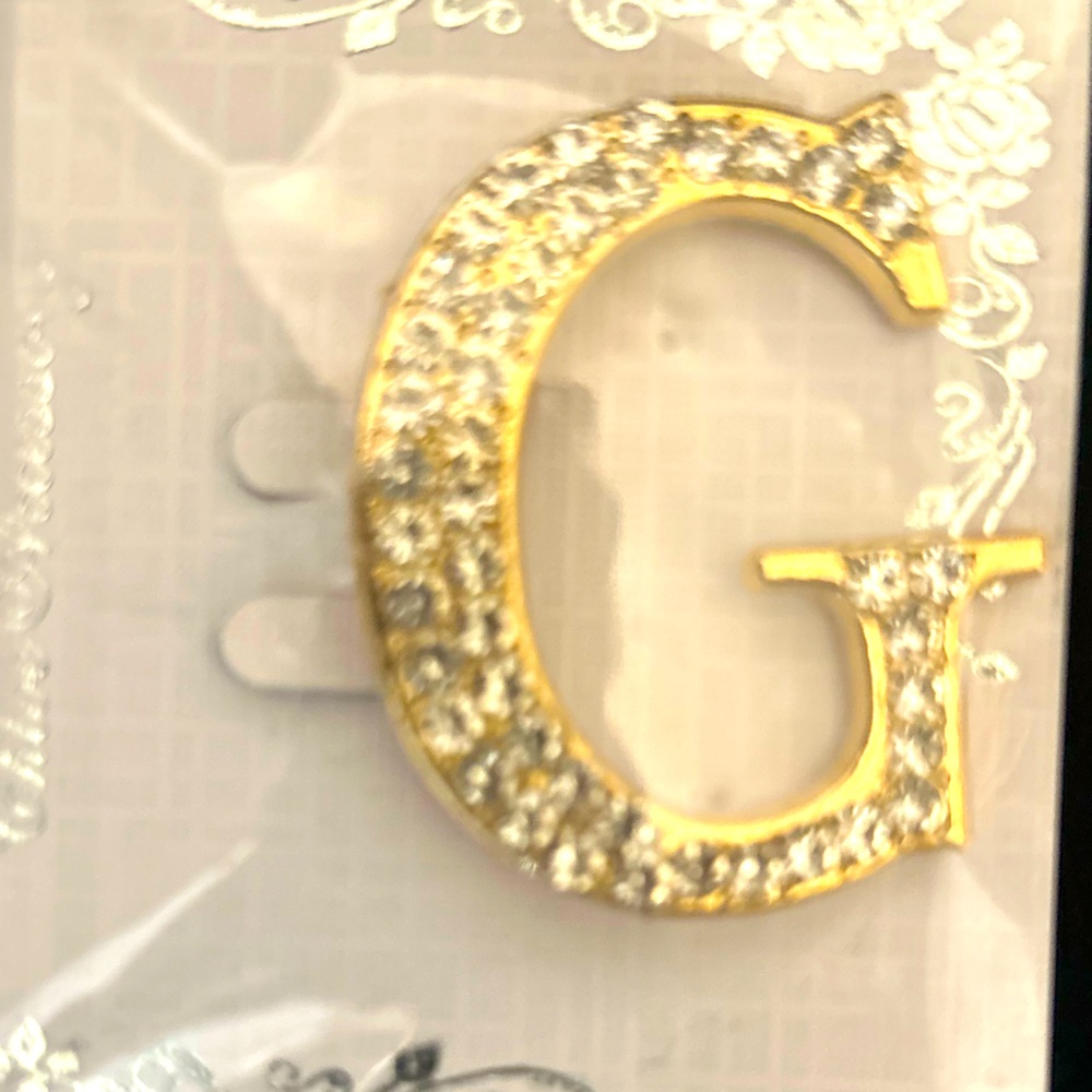 Elegant rhinestone letter “G” brooch Gold  tone